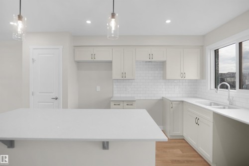 115 Nerine Crescent, St. Albert, AB - Indoor Photo Showing Kitchen With Double Sink With Upgraded Kitchen
