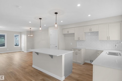 115 Nerine Crescent, St. Albert, AB - Indoor Photo Showing Kitchen With Double Sink With Upgraded Kitchen
