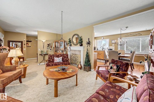 10715 50 Street Nw, Edmonton, AB - Indoor Photo Showing Living Room