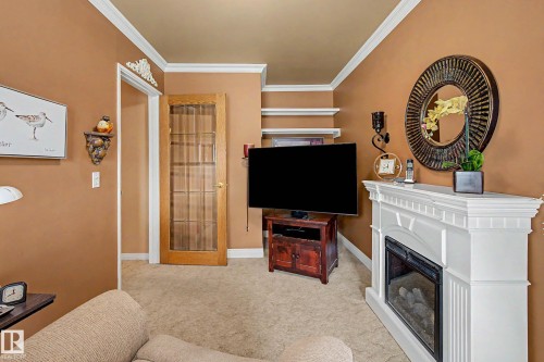 10715 50 Street Nw, Edmonton, AB - Indoor With Fireplace