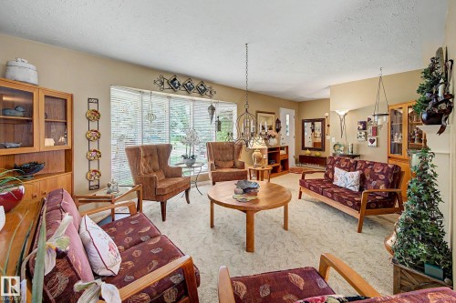 10715 50 Street Nw, Edmonton, AB - Indoor Photo Showing Living Room