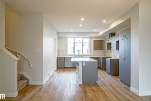 21148 25 Avenue Nw, Edmonton, AB - Indoor Photo Showing Kitchen With Upgraded Kitchen