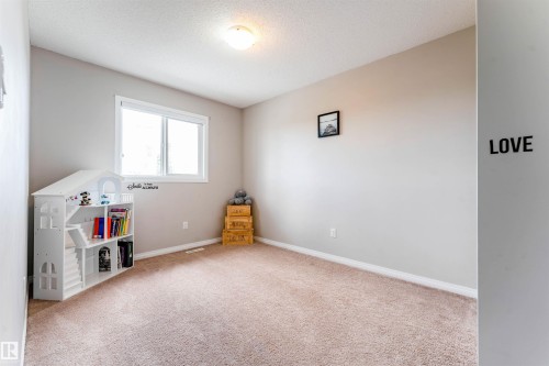 725 Secord Boulevard Nw, Edmonton, AB - Indoor Photo Showing Other Room