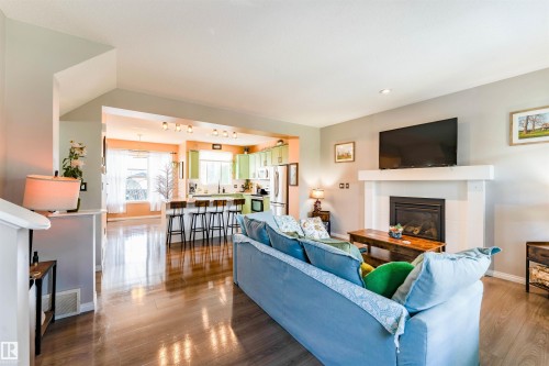 725 Secord Boulevard Nw, Edmonton, AB - Indoor Photo Showing Living Room With Fireplace