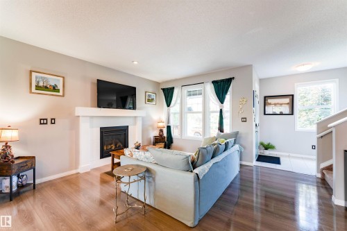 725 Secord Boulevard Nw, Edmonton, AB - Indoor Photo Showing Living Room With Fireplace