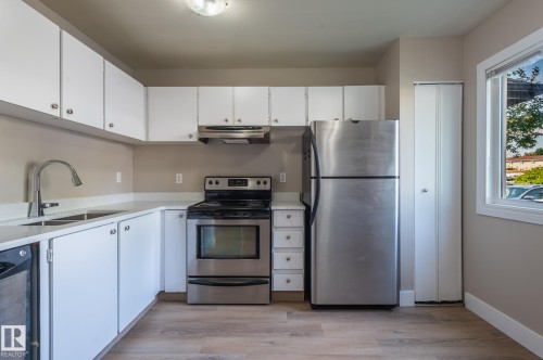 #34 14511 52 St Nw, Edmonton, AB - Indoor Photo Showing Kitchen With Stainless Steel Kitchen With Double Sink