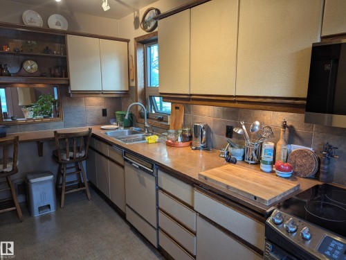 6551 112A Street Nw, Edmonton, AB - Indoor Photo Showing Kitchen With Double Sink
