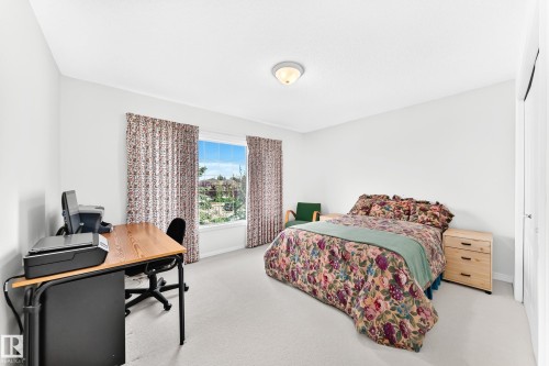 Recessed lighting, wall-to-wall carpeting, and a window with exterior scenery - 209 Carmichael Close Nw, Edmonton, AB - Indoor Photo Showing Bedroom