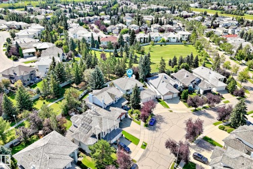 Expansive neighborhood with mature trees, green spaces, and a residential street network - 209 Carmichael Close Nw, Edmonton, AB - Outdoor With View