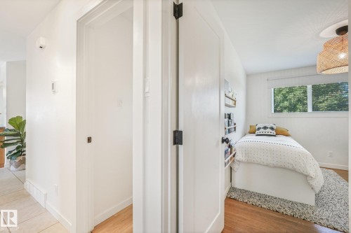 White walls and a hard-surface flooring - 16613 90 Avenue Nw, Edmonton, AB - Indoor Photo Showing Other Room