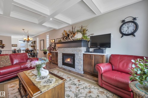122 Aston Bend, Leduc, AB - Indoor Photo Showing Living Room With Fireplace