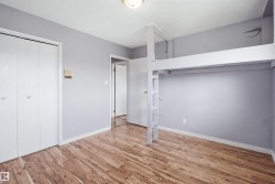 Wood-finish flooring, built-in loft structure, and bi-fold closet doors - 