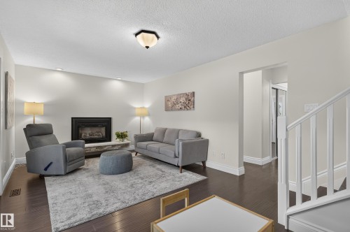 1 Georgia Place, St. Albert, AB - Indoor Photo Showing Living Room With Fireplace