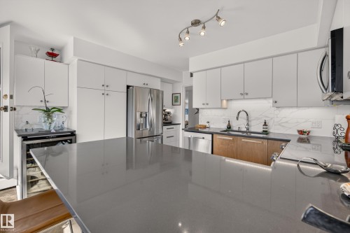 #303 9929 Saskatchewan Dr Nw, Edmonton, AB - Indoor Photo Showing Kitchen With Upgraded Kitchen