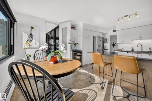 #303 9929 Saskatchewan Dr Nw, Edmonton, AB - Indoor Photo Showing Dining Room