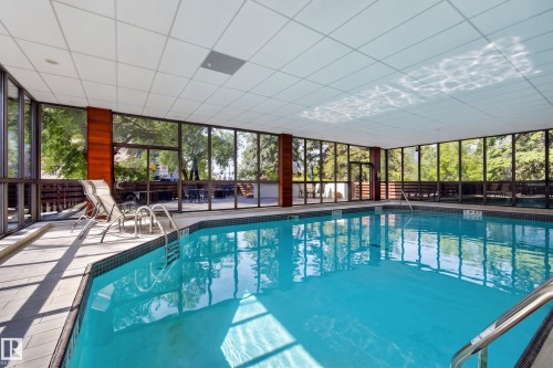 #303 9929 Saskatchewan Dr Nw, Edmonton, AB - Indoor Photo Showing Other Room With In Ground Pool
