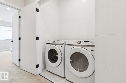 490 Robinson Boulevard, Leduc, AB - Indoor Photo Showing Laundry Room