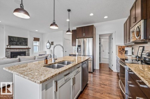 58 Ellice Bend, Fort Saskatchewan, AB - Indoor Photo Showing Kitchen With Double Sink With Upgraded Kitchen