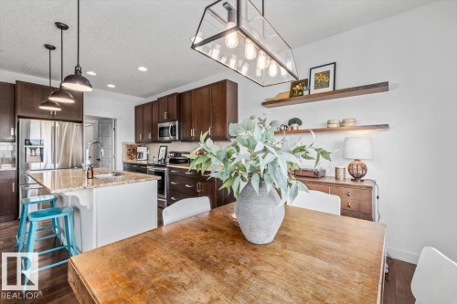 58 Ellice Bend, Fort Saskatchewan, AB - Indoor Photo Showing Kitchen With Upgraded Kitchen