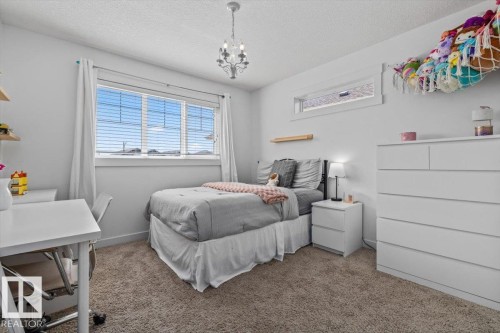 58 Ellice Bend, Fort Saskatchewan, AB - Indoor Photo Showing Bedroom