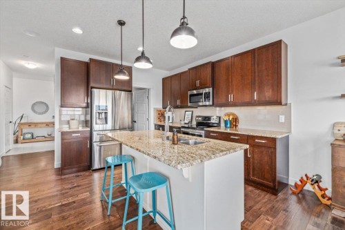 58 Ellice Bend, Fort Saskatchewan, AB - Indoor Photo Showing Kitchen With Double Sink With Upgraded Kitchen