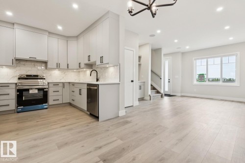 492 Robinson Boulevard, Leduc, AB - Indoor Photo Showing Kitchen With Upgraded Kitchen