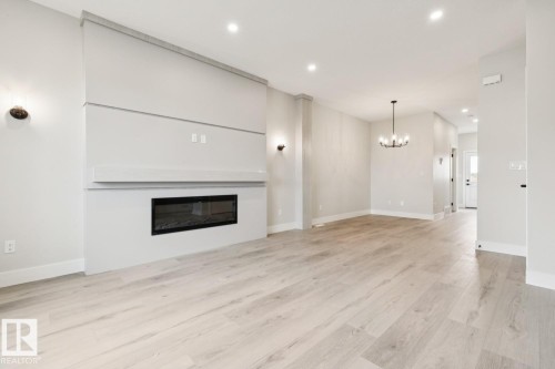 492 Robinson Boulevard, Leduc, AB - Indoor Photo Showing Living Room With Fireplace