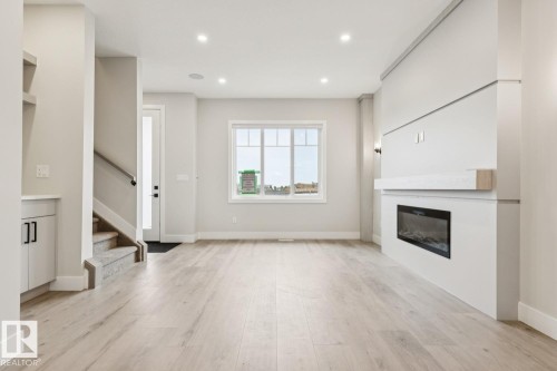 492 Robinson Boulevard, Leduc, AB - Indoor With Fireplace