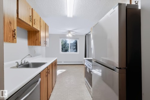 #101 10842 107 St Nw, Edmonton, AB - Indoor Photo Showing Kitchen