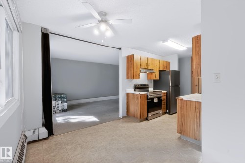 #101 10842 107 St Nw, Edmonton, AB - Indoor Photo Showing Kitchen