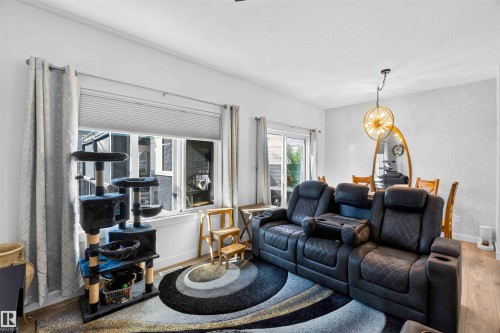 Additional content - 91 Hilton Cove, Spruce Grove, AB - Indoor Photo Showing Living Room