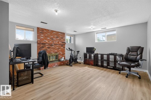 2408 80 Street Nw, Edmonton, AB - Indoor With Fireplace