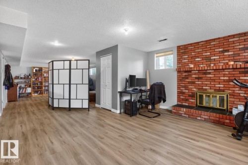 2408 80 Street Nw, Edmonton, AB - Indoor With Fireplace