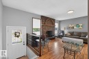 2408 80 Street Nw, Edmonton, AB  - Indoor Photo Showing Living Room With Fireplace 