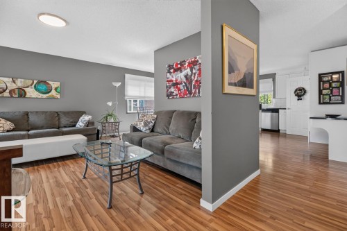 2408 80 Street Nw, Edmonton, AB - Indoor Photo Showing Living Room
