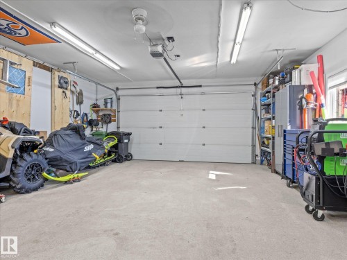 25 Wilkinson Place, Leduc, AB - Indoor Photo Showing Garage
