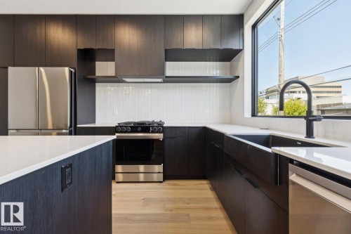 10329 Wadhurst Road Nw, Edmonton, AB - Indoor Photo Showing Kitchen With Upgraded Kitchen