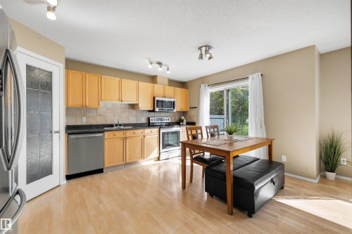 #3 450 Hyndman Cr Nw, Edmonton, AB - Indoor Photo Showing Kitchen With Double Sink