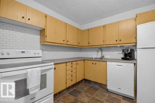 #804 11027 87 Av Nw, Edmonton, AB - Indoor Photo Showing Kitchen With Double Sink