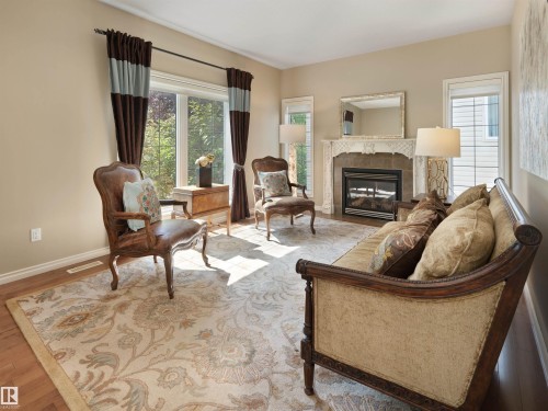 202 Saskatchewan Drive Nw, Edmonton, AB - Indoor Photo Showing Living Room With Fireplace