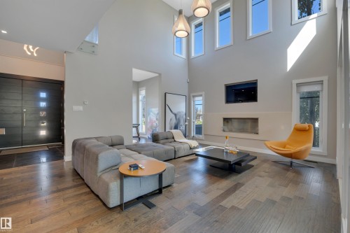 5047 Mcluhan Road Nw, Edmonton, AB - Indoor Photo Showing Living Room With Fireplace