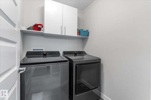 54 Astoria Place, Devon, AB - Indoor Photo Showing Laundry Room