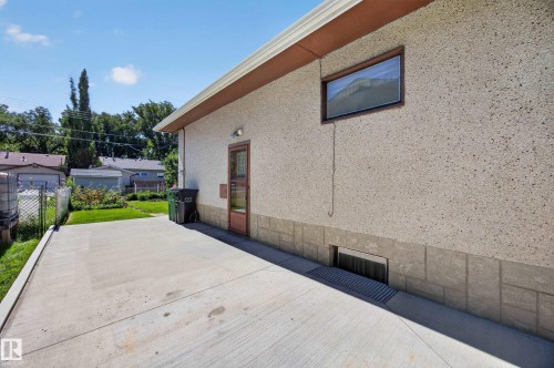 Concrete driveway providing off-street parking - 5207 48 Avenue, Leduc, AB - Outdoor With Exterior