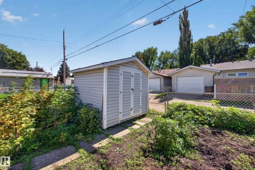 Detached storage shed with a gable roof - 5207 48 Avenue, Leduc, AB - Outdoor