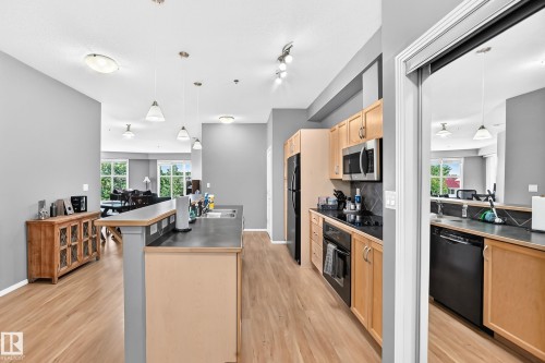 #349 4827 104A St Nw, Edmonton, AB - Indoor Photo Showing Kitchen With Double Sink With Upgraded Kitchen