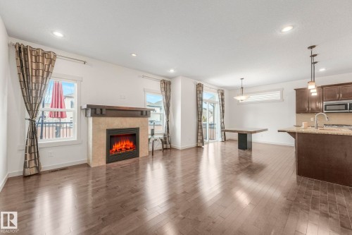 1548 36 Avenue Nw, Edmonton, AB - Indoor Photo Showing Living Room With Fireplace