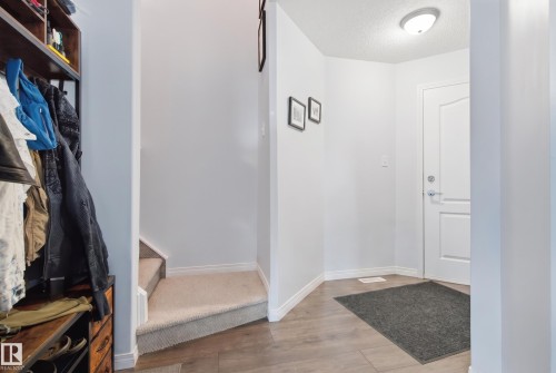 Recessed ceiling light fixture - #2415 9357 Simpson Dr Nw, Edmonton, AB - Indoor Photo Showing Other Room