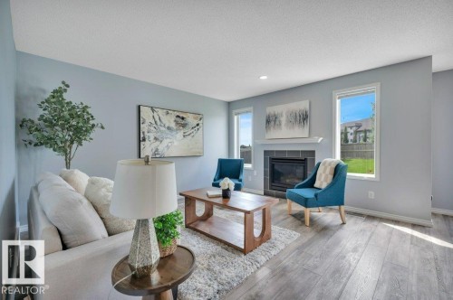 3508 16 Street Nw, Edmonton, AB - Indoor Photo Showing Living Room With Fireplace
