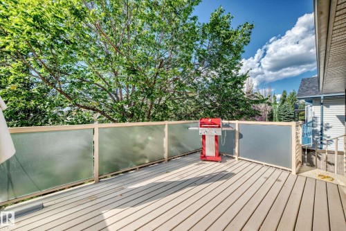 Expansive deck featuring composite decking and privacy railing - 4210 37 Avenue Nw, Edmonton, AB - Outdoor With Deck Patio Veranda