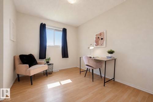 Recessed lighting, wood-finish flooring, and a window with blinds - 6768 39 Avenue Nw, Edmonton, AB - Indoor Photo Showing Office